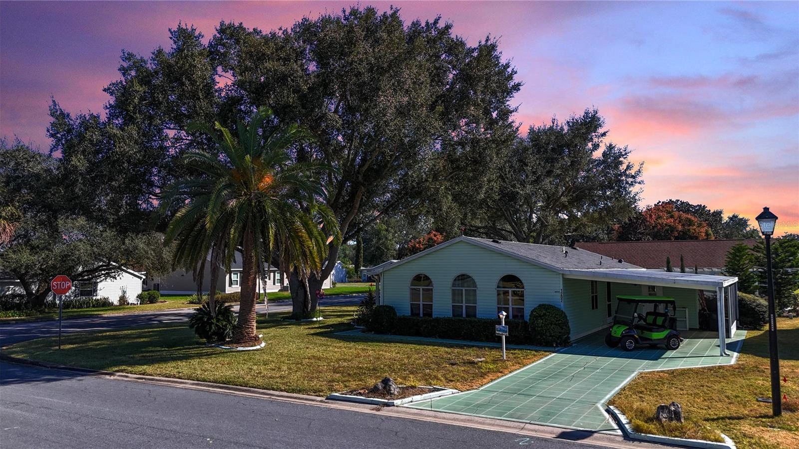 1202 Del Toro Dr, The Villages - front elevation at dusk